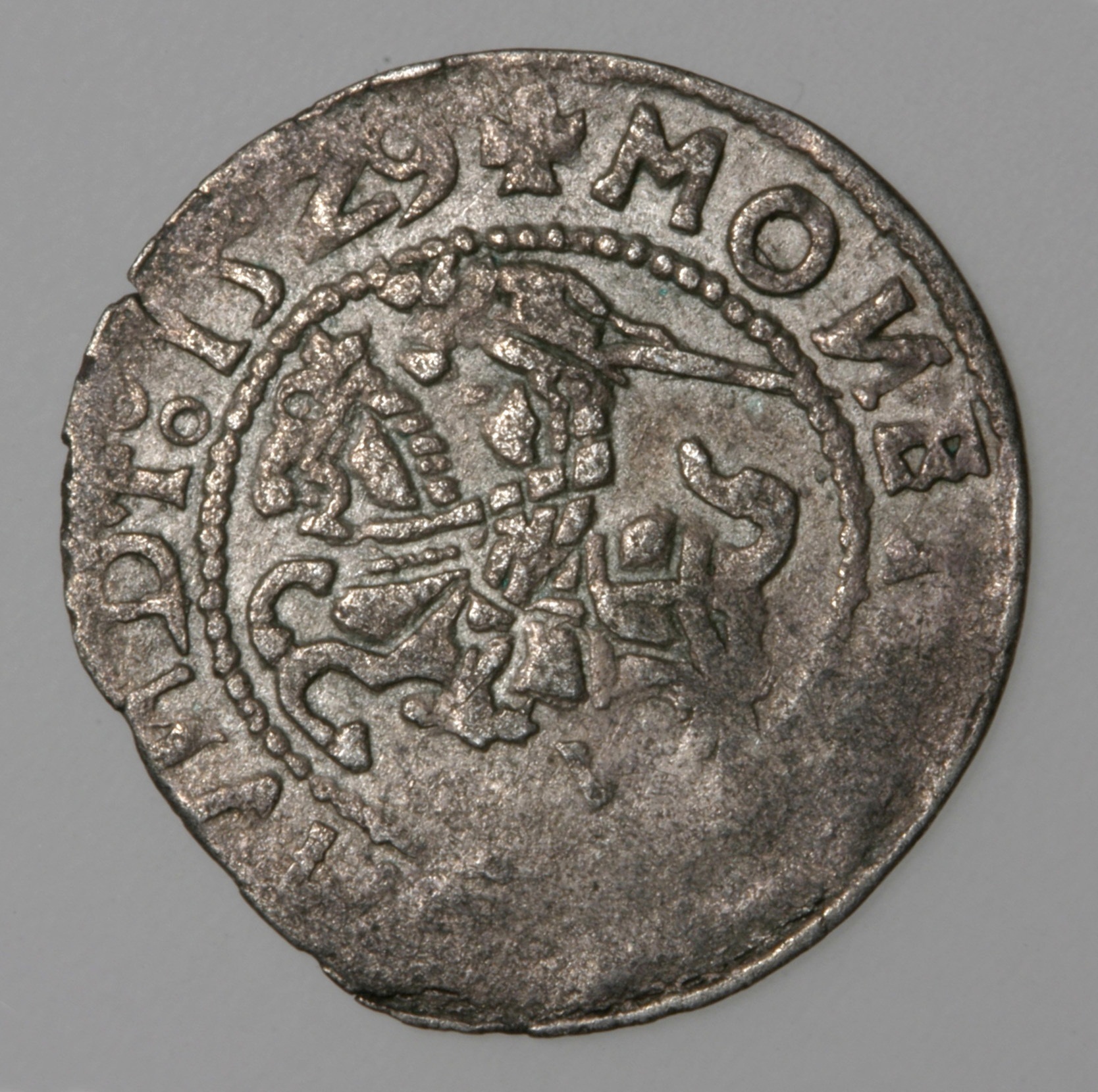 Half-groat of 1529 with the V letter (as The Vilnius Mint). Obverse