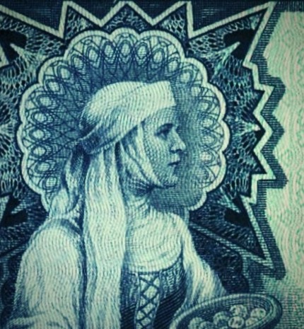 Moteris ant 1928 m. 100 litų banknoto