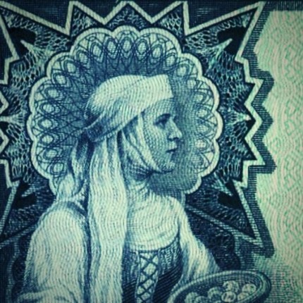 Moteris ant 1928 m. 100 litų banknoto